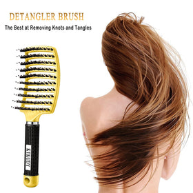 KTKUDY Detangling Brush in use on wet hair