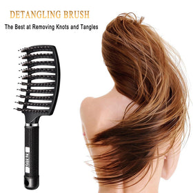 KTKUDY Detangling Brush in use on wet hair