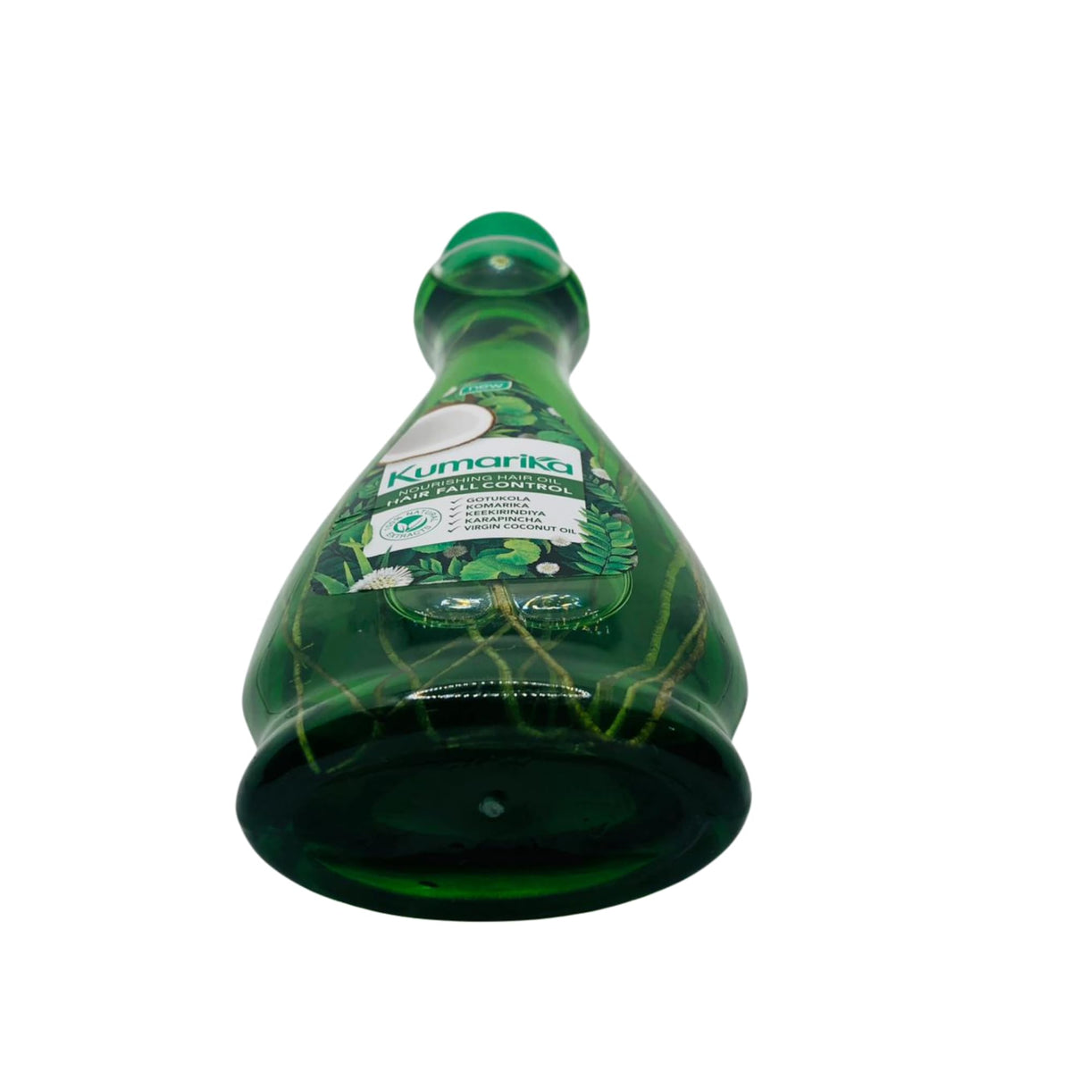 Kumarika Hair Oil packaging with natural herbs