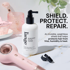 L'ANGE HAIR Gloss Shock spray on a bathroom counter