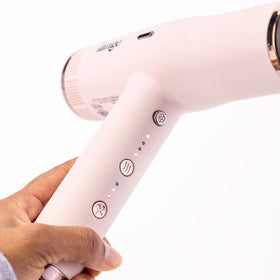 L'ANGE HAIR Le Styliste Hair Dryer in lifestyle setting with model