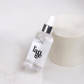 L'ANGE HAIR Rival Heat Shield with hair care products