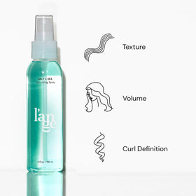 L'ANGE HAIR Sea Salt Texturizing Spray on a bathroom counter