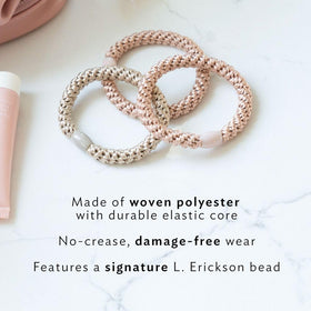 L. Erickson Black Hair Ties with Gold Bead in use on a ponytail