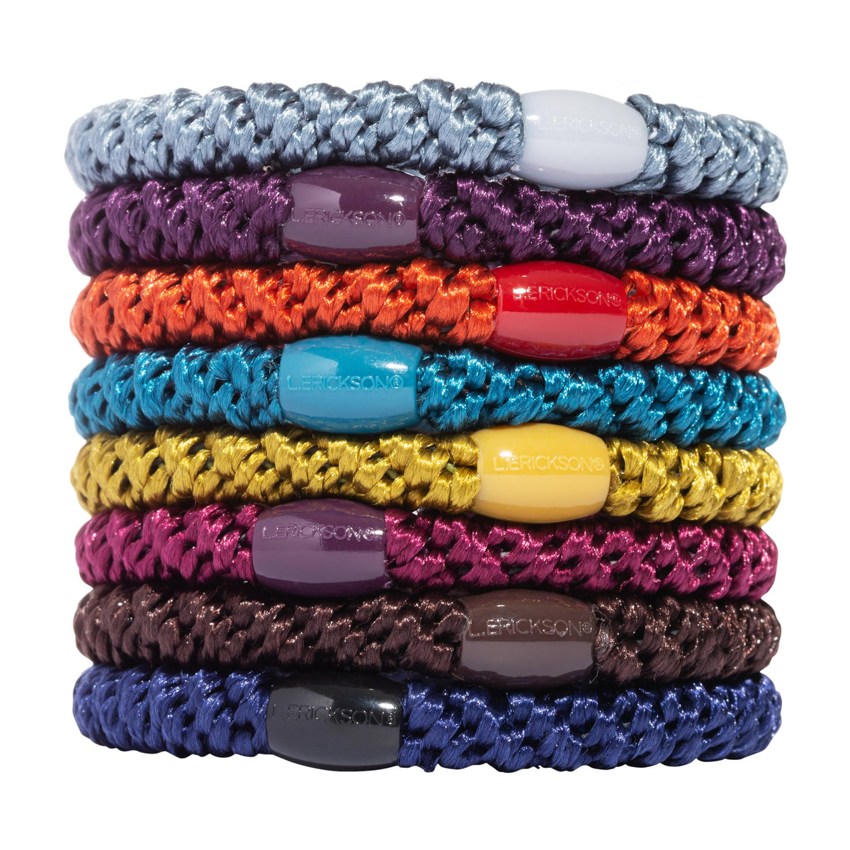 L. Erickson colorful hair ties in plum, slate blue, fiery orange, and golden yellow