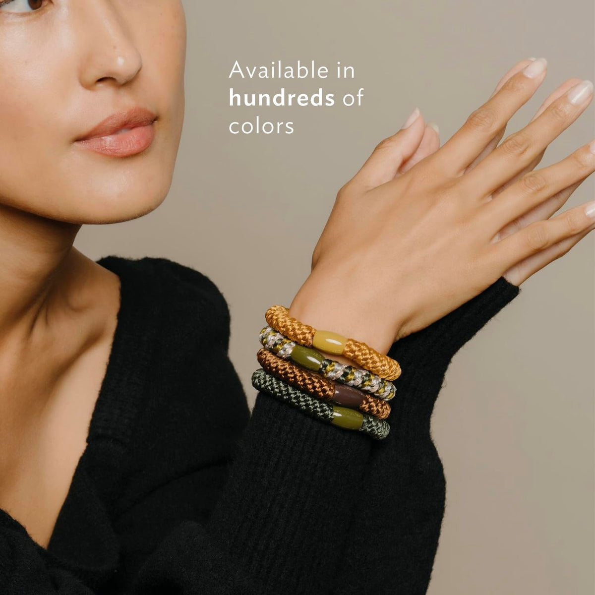 L. Erickson ponytail holders in use securing a high bun