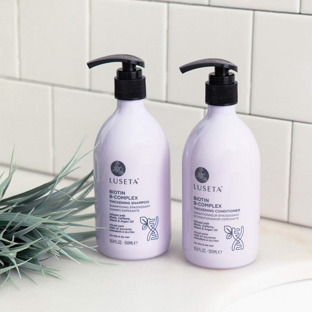 L LUSETA Biotin B-Complex Shampoo and Conditioner set on a bathroom shelf
