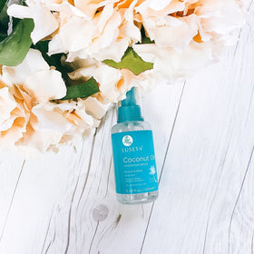 L LUSETA Coconut Milk Hair Repair Oil Serum lifestyle shot with hair