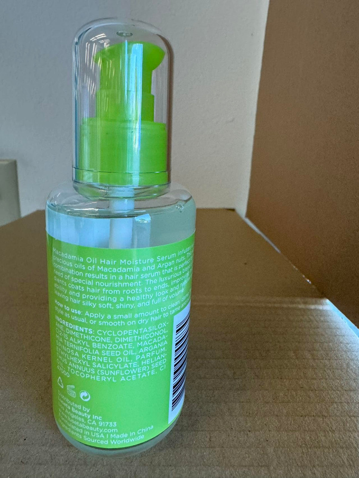 L LUSETA Macadamia Oil Hair Moisture Serum in hand for application