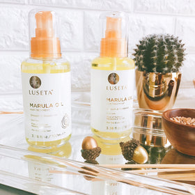 L LUSETA Marula Oil Hair Serum application on hair