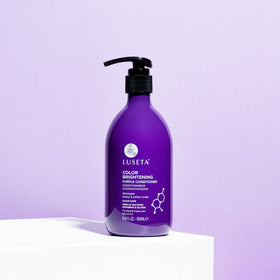 L LUSETA Purple Conditioner on a vanity table