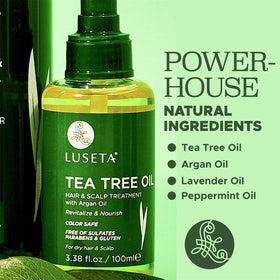 L LUSETA Tea Tree Hair Oil Serum on a wooden table