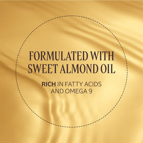 L'OCCITANE Almond Shower Oil with a towel