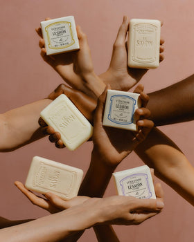 L'OCCITANE Shea Milk Extra Rich Soap lathering on skin