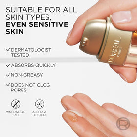 L'Oreal Paris Age Perfect Serum Le Duo with a soft towel