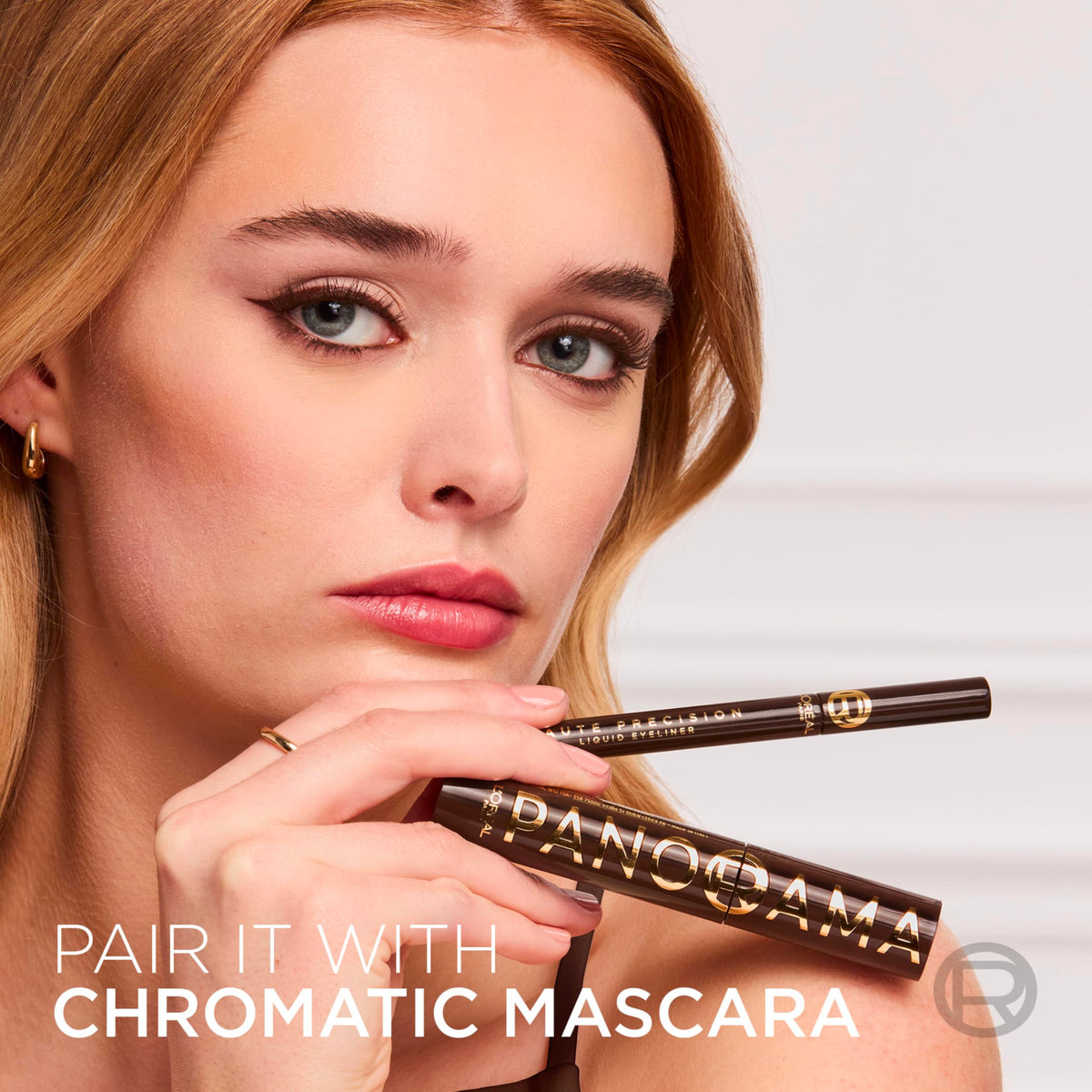 L'Oreal Paris Liquid Eyeliner in use during makeup application