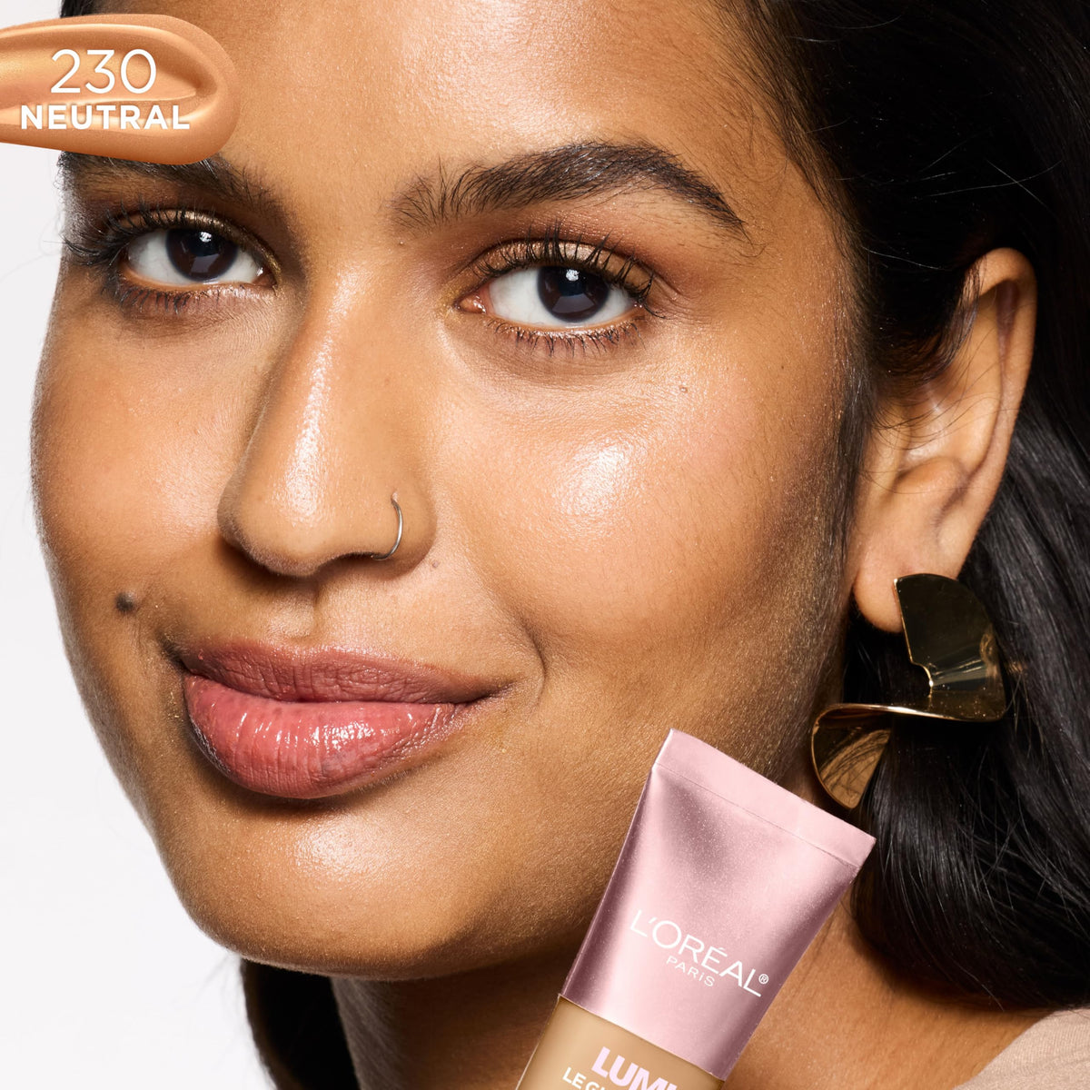 L'Oreal Paris Lumi Le Glow Skin Tint 230 application on skin