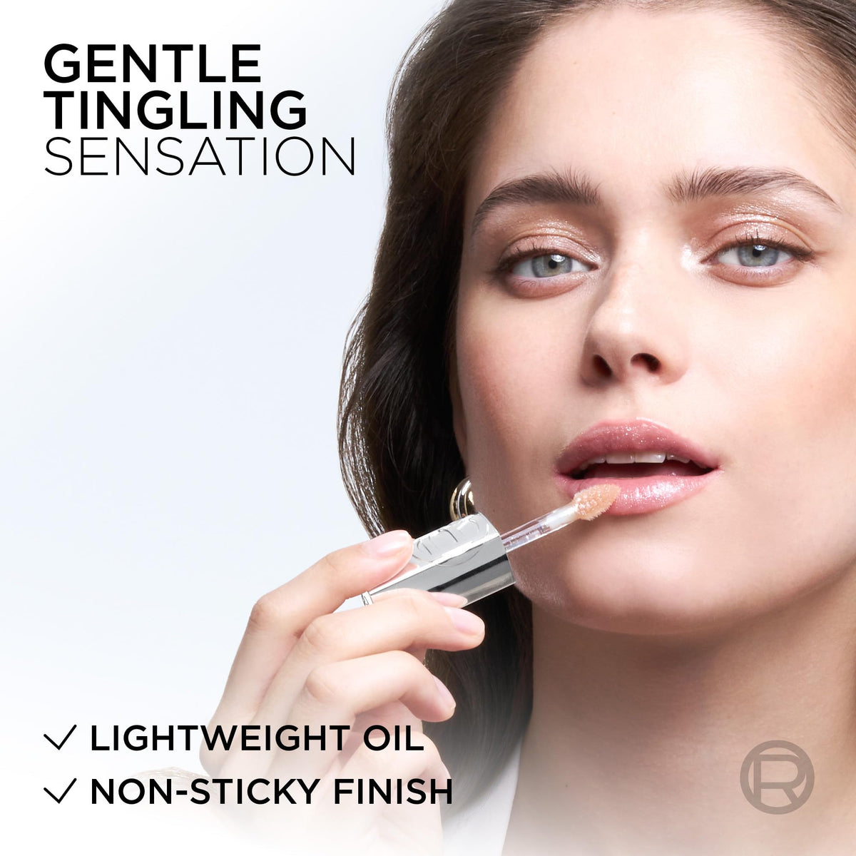 L'Oreal Paris Plump Ambition Lip Oil applied on lips