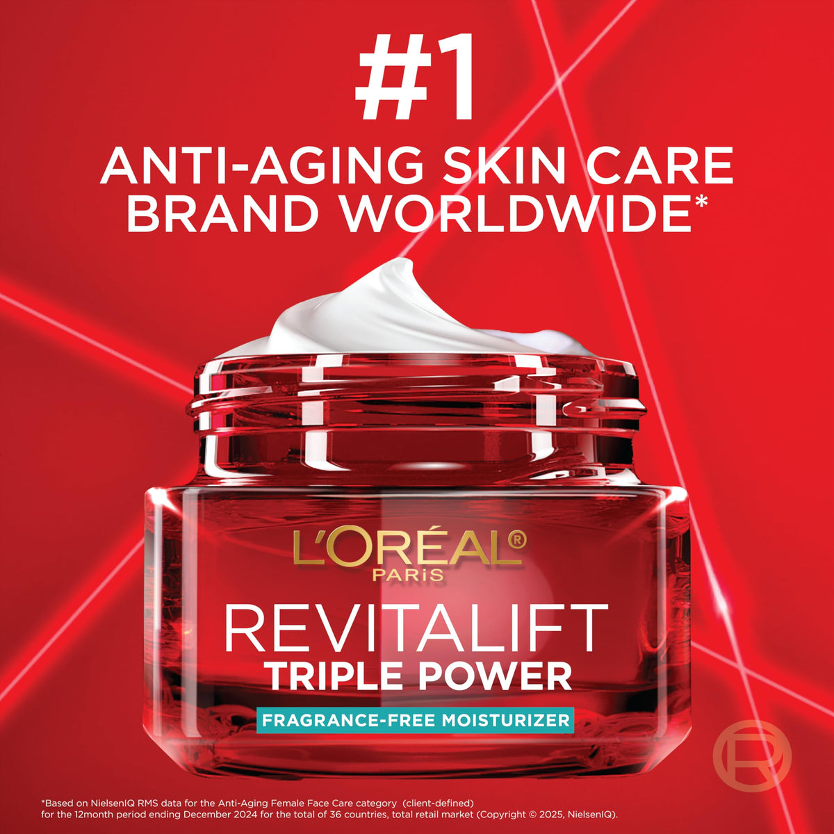 L'Oreal Paris Revitalift moisturizer in hand