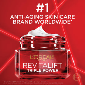 L'Oreal Paris Revitalift Triple Power Face Moisturizer on bathroom counter
