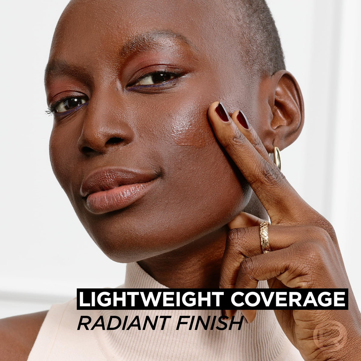 L'Oreal Paris True Match Nude Hyaluronic Tinted Serum Foundation in a makeup bag