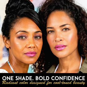 L'Paige Frosted Amethyst Lipstick on vanity with makeup accessories