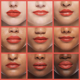 L'Paige Peach Nectar Lipstick in use on model's lips