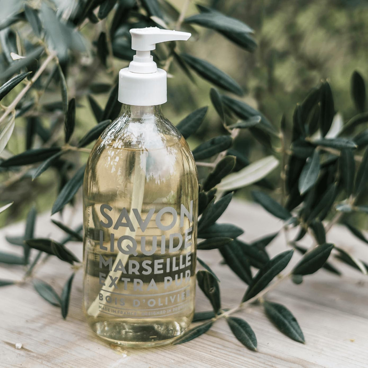 La Compagnie de Provence Savon de Marseille Liquid Soap Olive Wood close-up of label