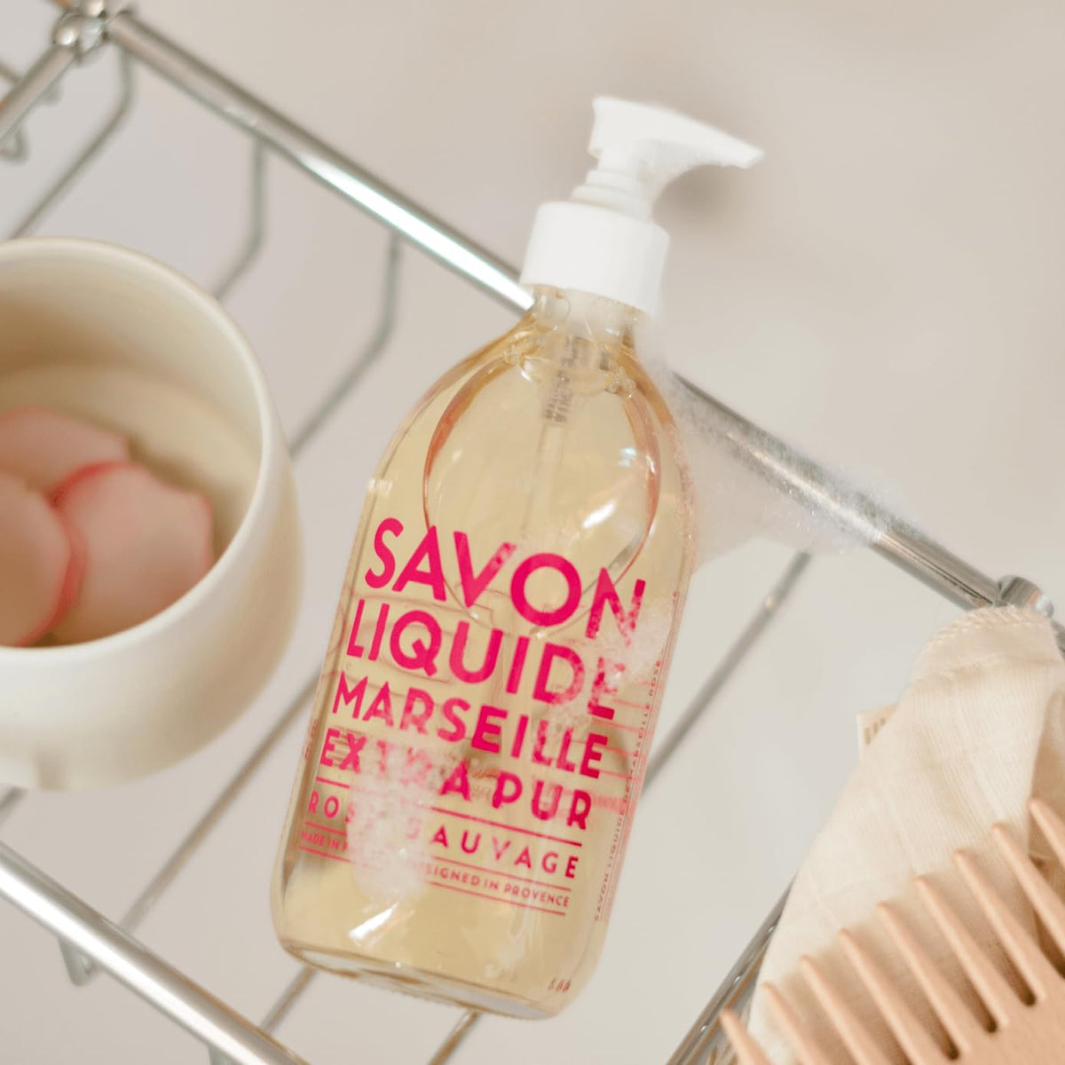 La Compagnie de Provence Wild Rose Liquid Soap on kitchen counter