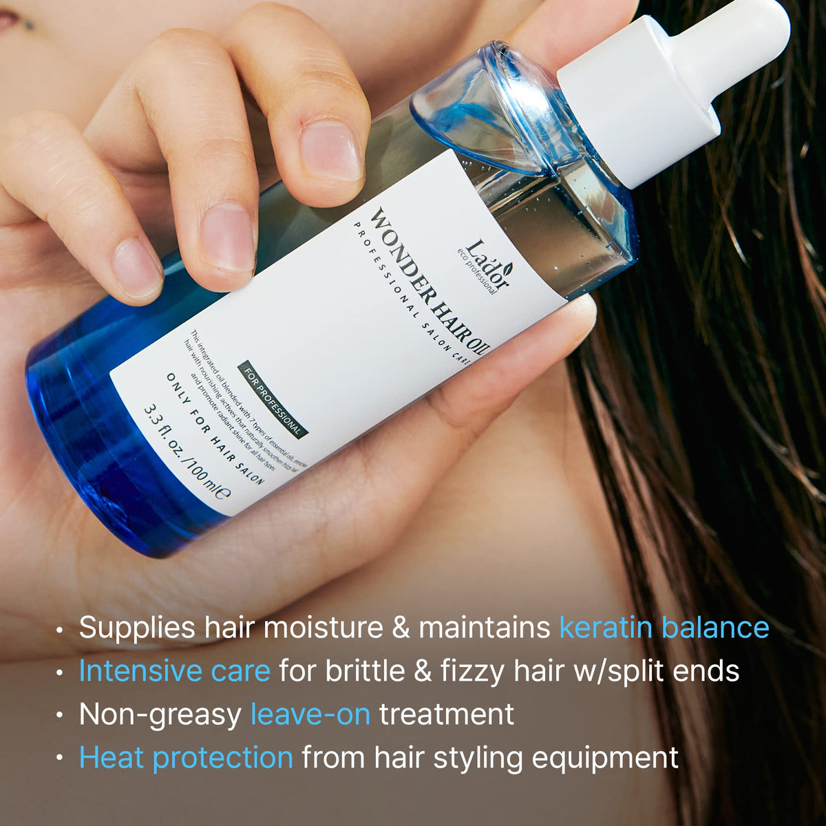 LA'DOR Wonder Hair Oil in lifestyle setting on a vanity