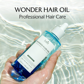 LA'DOR Wonder Hair Oil side view highlighting the pump