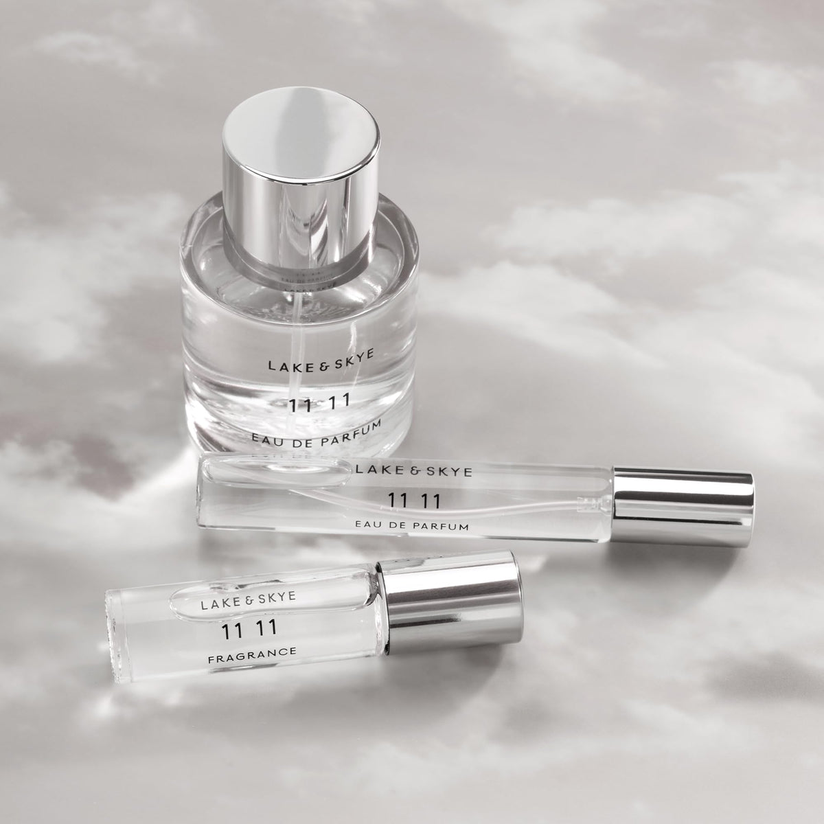 Lake & Skye 11 11 Eau de Parfum Travel Spray with floral background