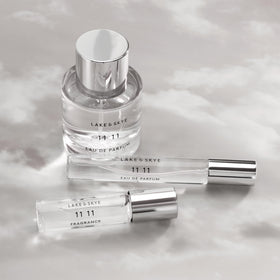 Lake & Skye 11 11 Eau de Parfum Travel Spray with floral background