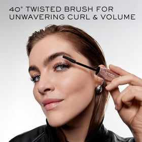 Lancôme Curl Goddess Mascara travel size 01 Black on a makeup table