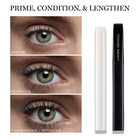 Lancôme Définicils mascara with a background of beauty tools