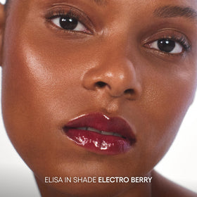 LANEIGE JuicePop Box Lip Tint Electro Berry held in hand