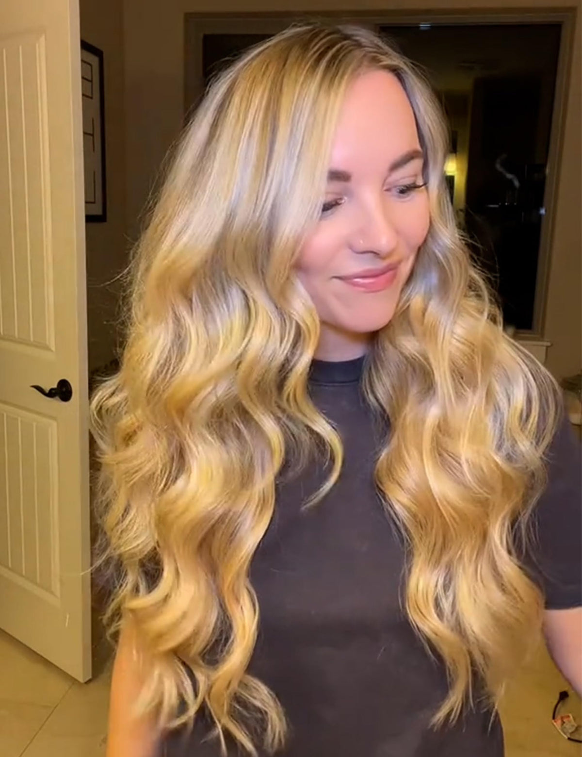 LANVIER curling iron showing adjustable temperature settings