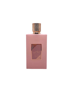 Lattafa Ameerat Al Arab Prive Rose Eau de Parfum bottle with floral background