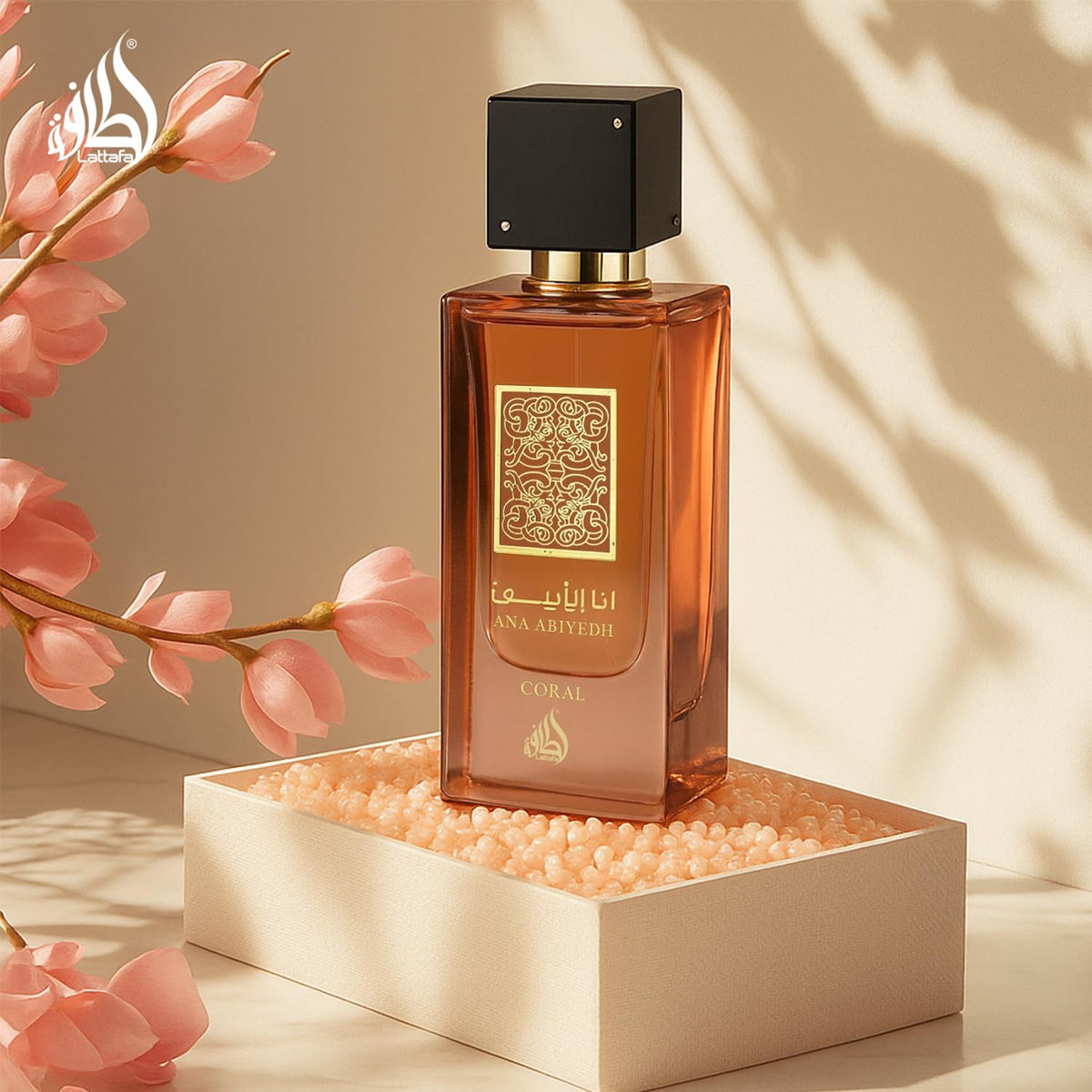 Lattafa Ana Abiyedh Coral Eau de Parfum with floral background