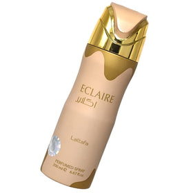 Lattafa Eclaire deodorant spray with floral background