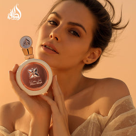 Lattafa Fakhar Eau de Parfum 100ml with flowers