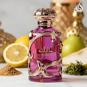 Lattafa Habik Eau de Parfum 100 ml with fresh flowers in the background