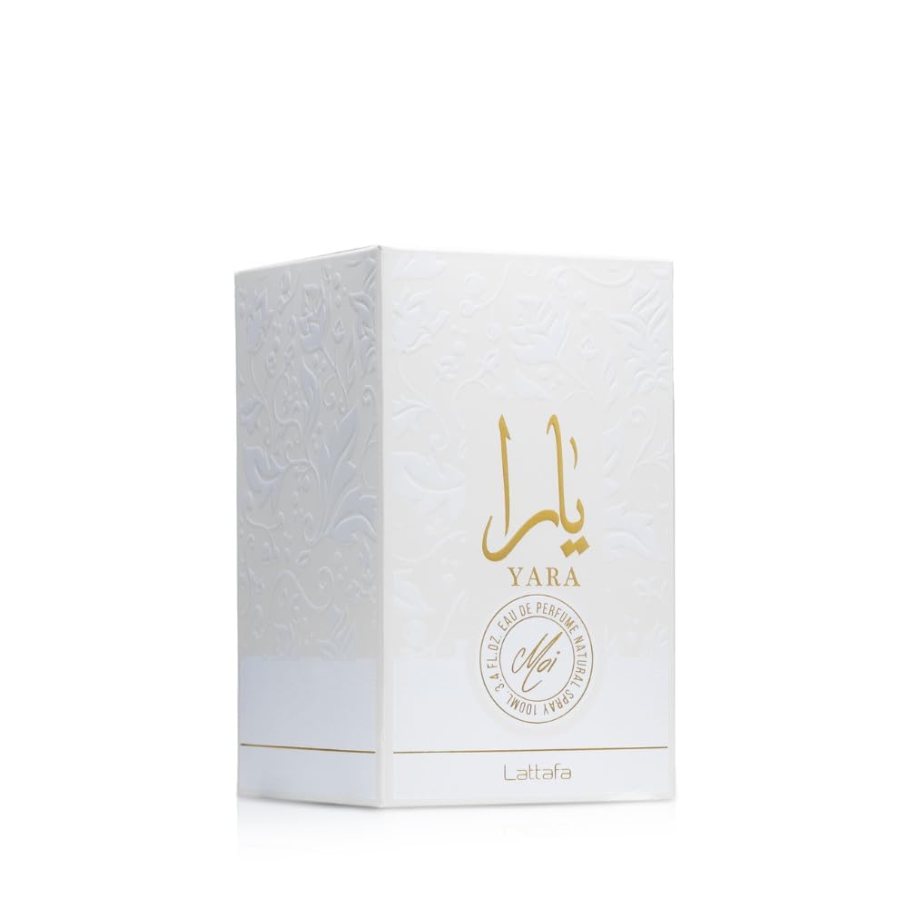 Lattafa Yara Moi bottle with floral background