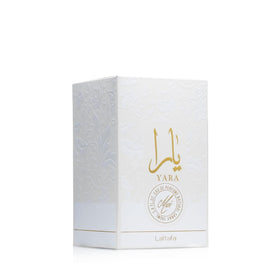 Lattafa Yara Moi bottle with floral background