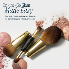 LAURA GELLER 4-in-1 brush in hand for makeup application