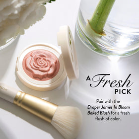 LAURA GELLER Angled Blush Brush being used on cheeks