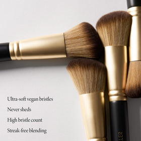 LAURA GELLER Angled Blush Brush in use applying blush on cheeks