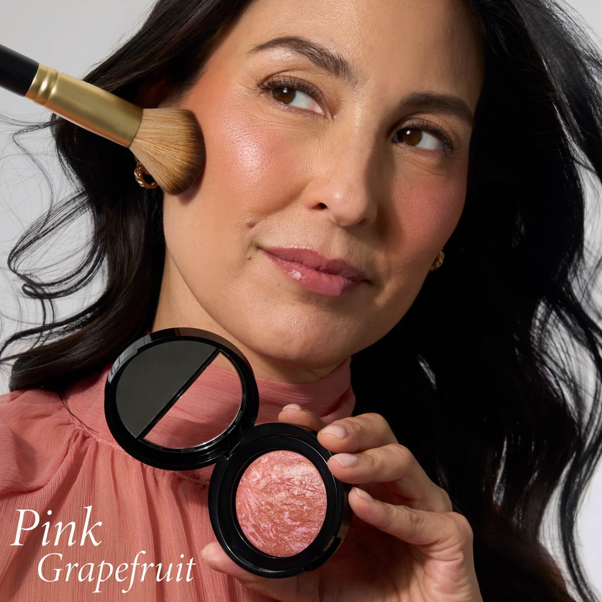 LAURA GELLER Baked Blush-n-Brighten Powder Blush close-up of texture