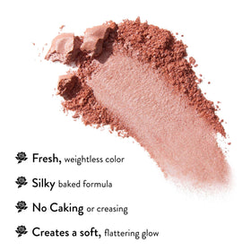 LAURA GELLER Baked Blush-n-Brighten Powder Blush In Bloom applied on skin