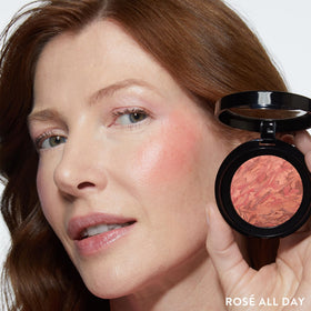 LAURA GELLER Baked Blush-n-Brighten Powder Blush swatch on skin
